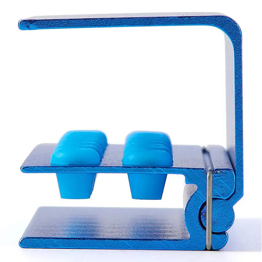 Dental Burs Holder Block 16 Holes with Silicon Cover FG RA Autoclavable: Blue aluminum dental bur block with silicon cover, showing two blue compartments for storing dental burs, featuring a compact L-shaped design for efficient organization and sterilization.