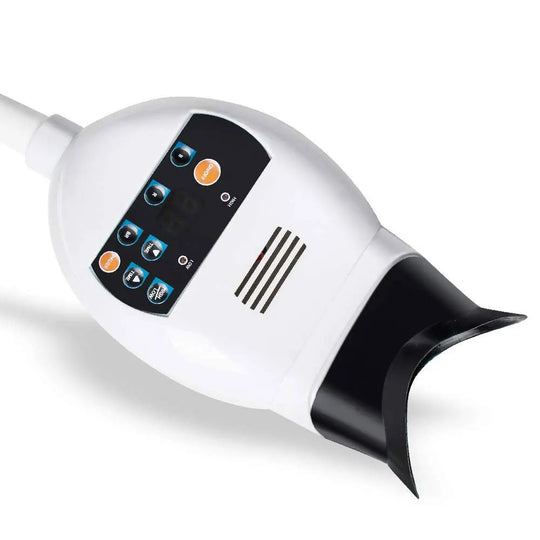 Dental Cold Whitening Light Lamp 3 Light Source Table Type with white oval-shaped body, control panel with blue and orange buttons, black mouth guard attachment, and white power cord for professional teeth whitening treatments