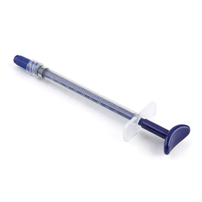 Dental Disposable Endo Irrigation Syringe 50 Pcs And Tip 50 Pcs - Single clear plastic syringe with blue plunger and tip, featuring measurement markings on barrel, for precise dental irrigation procedures