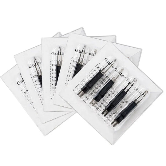 Dental Heated Gutta Cutter Tips displayed in multiple transparent packages, showing black and silver cutting tools for dental procedures. Professional-grade dental instruments for precise gutta-percha cutting and shaping during root canal treatments.