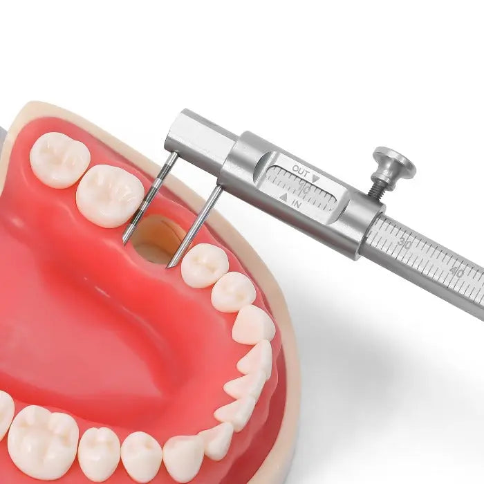 Dental Implant Measuring Gauge Orthodontic Sliding Caliper measuring interdental distance on dental model. Stainless steel caliper with double scale, 0-80mm range, for precise measurements during implantation and orthodontics procedures.