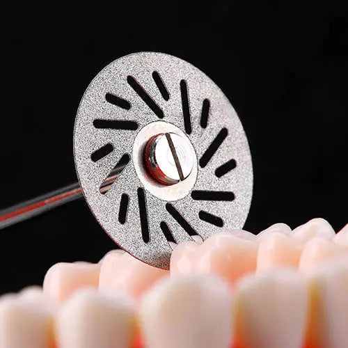 Dental Lab Thin Diamond Disc Cutting Double Side Disk Tool For Polisher Machine: Close-up of silver circular diamond disc with radiating cuts, positioned above dental implants, showcasing its precision cutting and polishing capabilities for dental laboratory work.