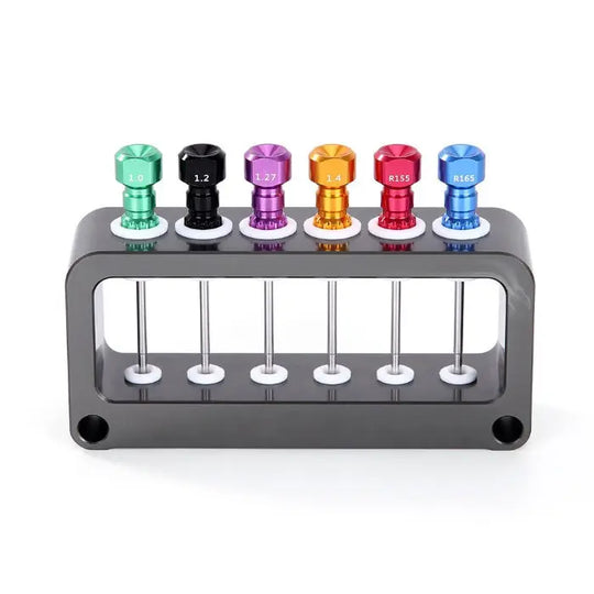 Dental Laboratory Implant Screwdriver Autoclavable Holder Base Stand featuring six colorful aluminum screwdriver heads mounted on a gray metal stand with vertical storage slots, designed for organized and efficient dental tool management