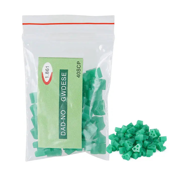 Dental Matrix Sectional Silicone Wedges set with green wedges in plastic bag and outside bag, part of comprehensive dental tool kit for precise tooth restoration and contouring procedures