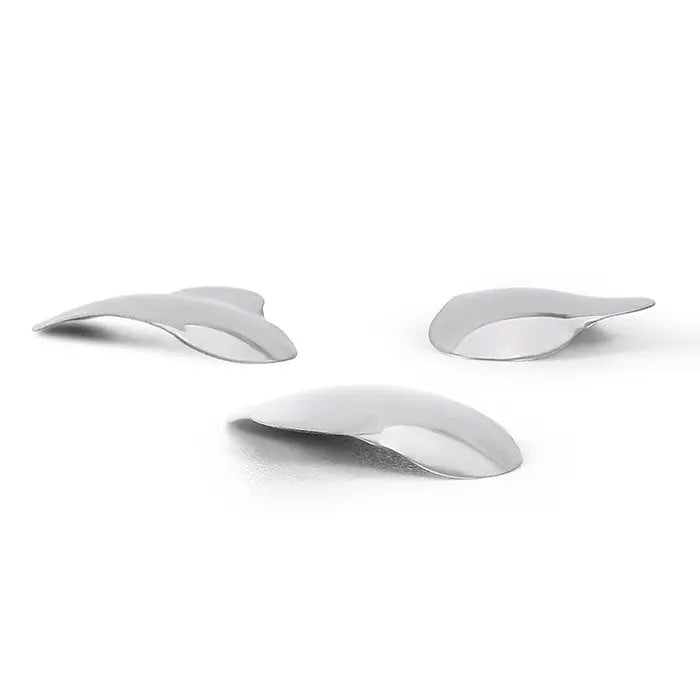 Three curved white dental sectional matrices from the Dental Matrix Sectional Silicone Wedges Sectional Contoured Metal Matrices Plier Set, showcasing their contoured shape for precise dental procedures