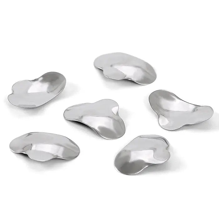 Dental Matrix Sectional Silicone Wedges Sectional Contoured Metal Matrices Plier Set: Closeup of six shiny, curved metal dental matrices in various sizes and shapes, essential components for dental procedures and restorations.