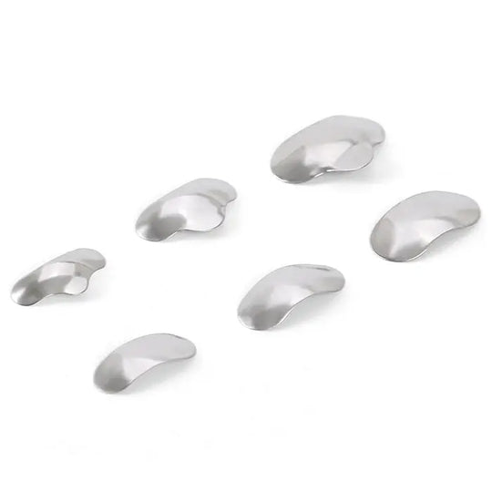 Dental Matrix Sectional Silicone Wedges Set: Assorted sizes of curved metal matrices for dental procedures, part of comprehensive kit including wedges and pliers for optimal tooth restoration and contouring