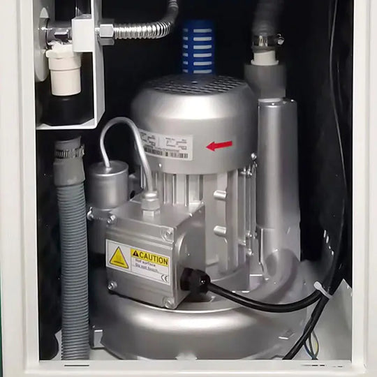 Dental Mobile Vacuum Suction Unit Systems High Suction Pump 400W: Interior view of compact dental suction system with silver motor, hoses, and caution label visible. Designed for efficient dental procedures with powerful suction capabilities and easy mobility.