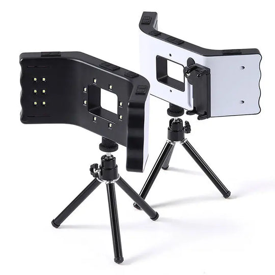 Dental Oral Photography LED Lamp Flash Light with Three Foot Bracket shown with two adjustable tripod mounts, one black and one white, featuring LED light panels and smartphone holders for dental imaging and photography purposes.