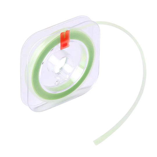 Dental Polishing Strip And Dental Resin Polishing Strip Holder: Square plastic dispenser containing a coiled green dental polishing strip with red tab for easy dispensing. Essential tool for dental professionals to polish resin restorations and interproximal areas.