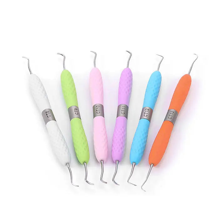 Dental Restoration Instruments Enamel Chisel Set 6 Models featuring colorful silicone handles in white, green, pink, purple, blue, and orange, with metal tips for precise dental work, arranged in a row on a white background.