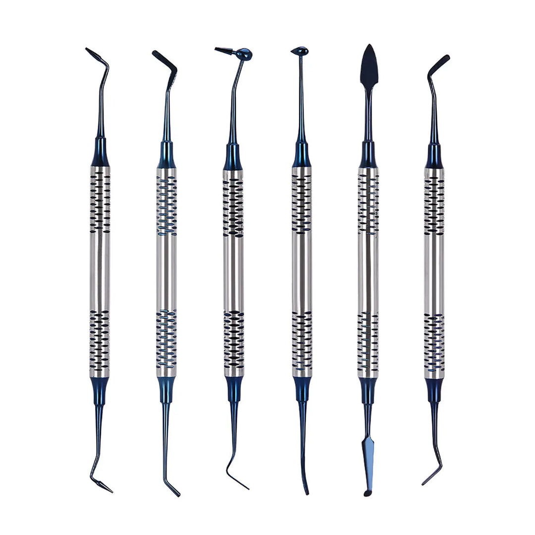 Dental Tools Composite Resin Filling Spatula set with titanium plated blue heads. Six precision instruments for dental procedures, featuring textured stainless steel handles and varied tip shapes for composite filling and shaping.