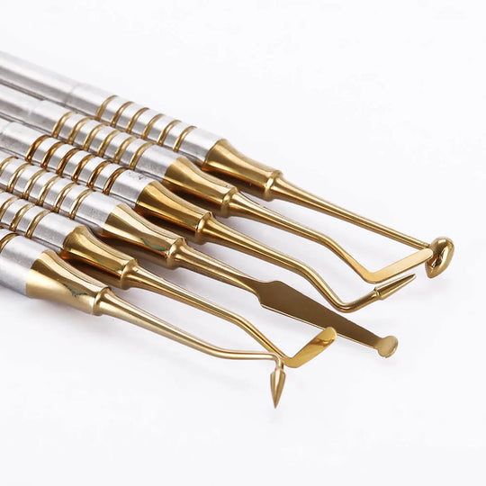 Dental Tools Composite Resin Filling Spatula Titanium Plated Head Filler Gold - Set of 6 stainless steel dental instruments with gold-colored titanium plated heads and various shaped tips for precise composite resin filling and smoothing