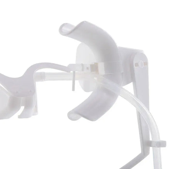 Dental Adjustable Orthodontics Nola Cheek Retractor With Dry Field System White/Green, close-up view of the white plastic device with curved components and attached tubes for saliva suction, designed for comfortable dental procedures and moisture control