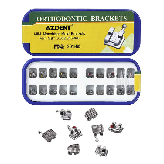 Dental Metal Brackets MIM Monoblock Mini MBT 0.022 Hooks on 345 20pcs/Kit: Orthodontic brackets in blue case showing various sizes and types. Color-coded for easy identification. Additional loose brackets displayed below the case, showcasing design and structure for dental treatments.