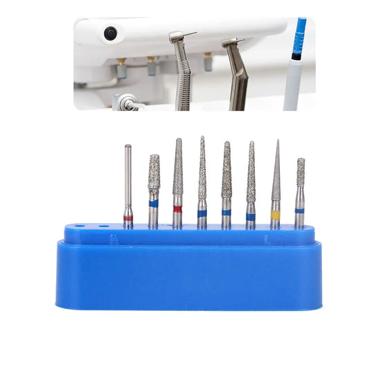 Dental Diamond Bur FG-113 Crown Preparation Molar Teeth Kit 8pcs/Kit featuring various shaped diamond-tipped burs in a blue organizer stand, alongside dental handpieces in the background for professional tooth preparation and restoration.