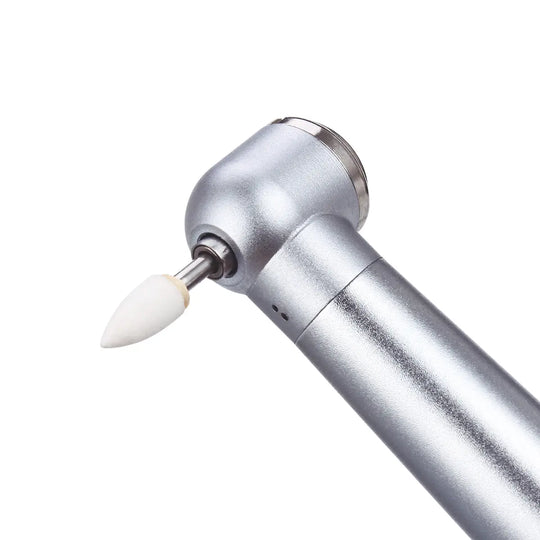 Dental Polishing FG Burs Flame Shape White Stone 12pcs/Kit shown with close-up of silver dental handpiece featuring white flame-shaped polishing bur attached, highlighting precision tool for dental procedures