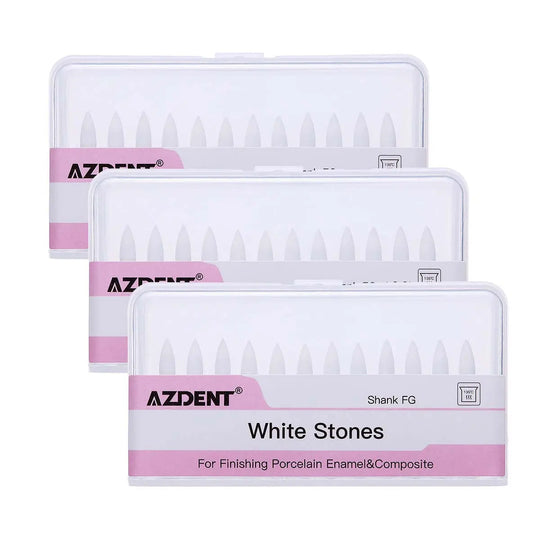 Dental Polishing FG Burs Flame Shape White Stone 12pcs/Kit displayed in three transparent plastic cases. Each case contains white flame-shaped dental burs for polishing. Pink labels on cases indicate AZDENT brand and "White Stones" for finishing porcelain enamels and composites.