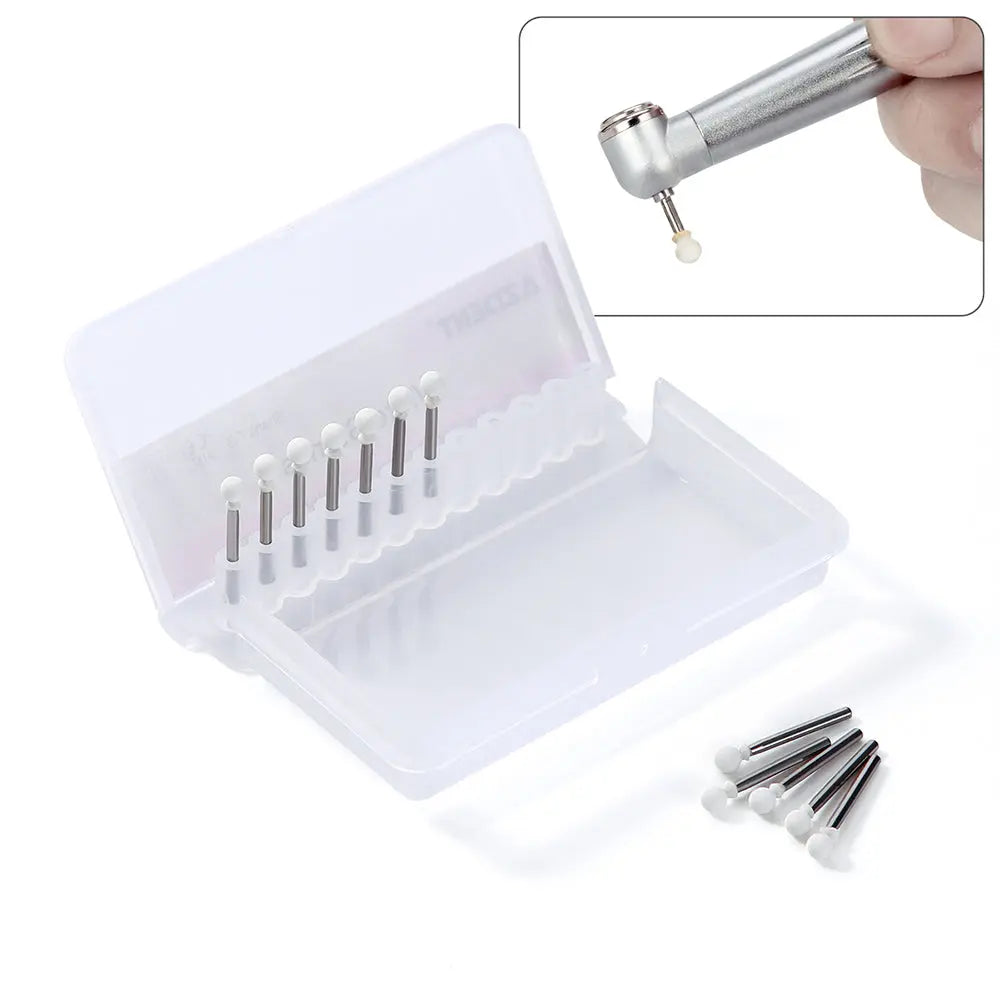 Dental Polishing FG Burs Round Shape White Stone 12pcs/Kit displayed in a white plastic storage case with inset image showing a dental handpiece holding a bur, and loose burs visible beside the case