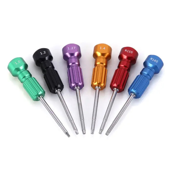 Dental Implant Screw Driver Manual Use 6pcs/Kit featuring colorful anodized aluminum handles and stainless steel shafts. Set includes six drivers with different sizes marked on tops, arranged in a fan-like display showing various compatible implant systems.