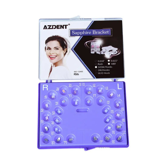 Dental Ceramic Bracket Positioning Monocrystalline Sapphire & Buccal Tube Mini Roth/MBT 0.022 Hooks on 345 kit box open, showing purple tray with 28 transparent brackets arranged in dental arch pattern, and product information on packaging lid