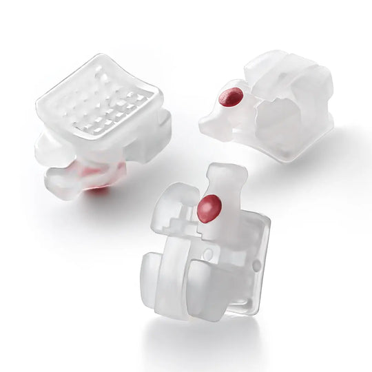 Dental Self-ligating Ceramic Brackets Clear Roth/MBT 0.022 with hook 3,4,5 - Three translucent white orthodontic brackets with red accents, showcasing smooth edges and innovative self-ligating design for comfort and efficient tooth movement.