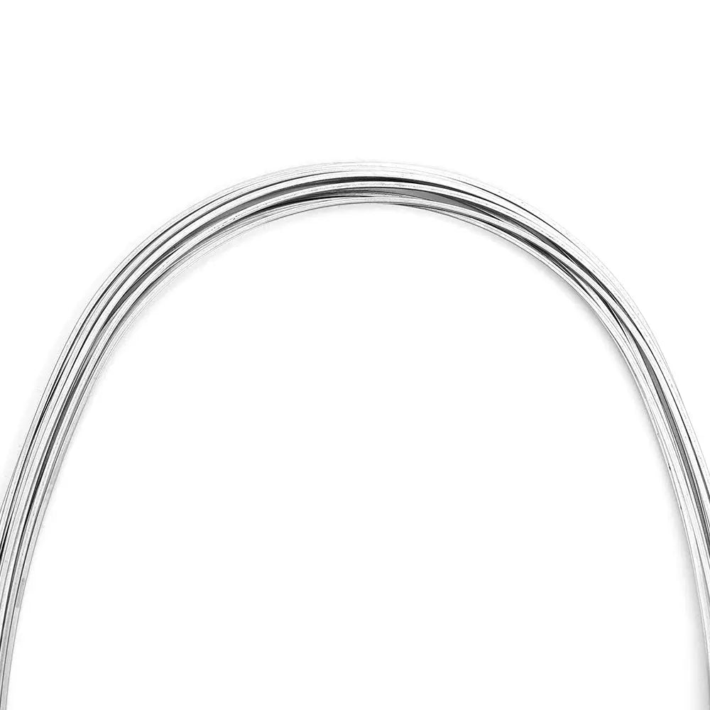 Archwire Stainless Steel Oval Form Rectangular 0.017 x 0.022 Upper 10pcs/Pack: Close-up view of shiny, curved stainless steel orthodontic wire with smooth surface and oval shape, demonstrating its flexibility and precision for dental applications.