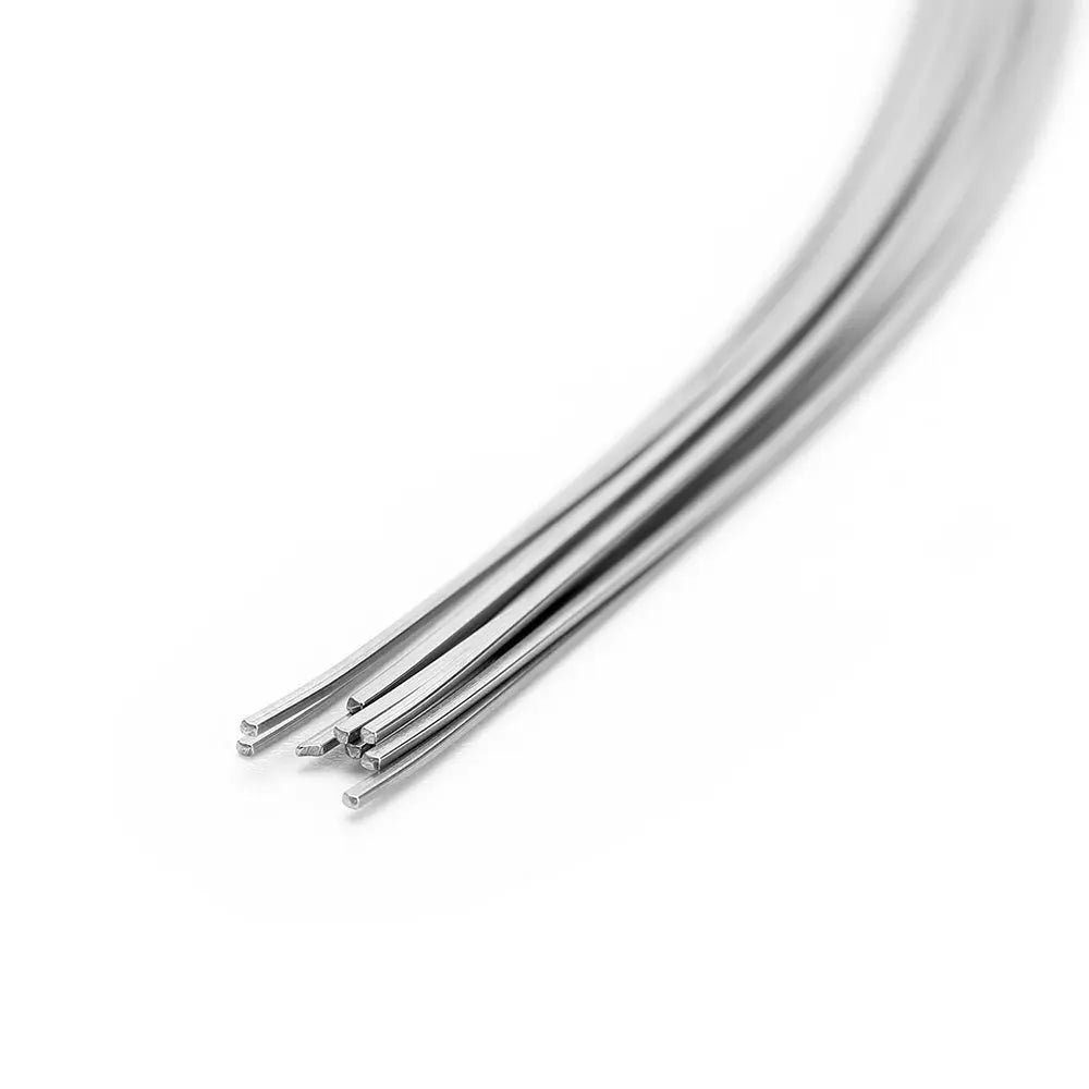 Close-up view of Archwire Stainless Steel Oval Form Rectangular 0.017 x 0.022 Upper 10pcs/Pack, showing multiple thin, curved metal wires with a shiny silver finish, highlighting the product's flexibility and high-quality stainless steel material for orthodontic use.