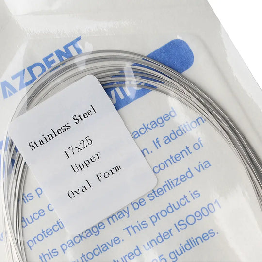 Archwire Stainless Steel Oval Form Rectangular 0.017 x 0.025 Upper 10pcs/Pack in clear packaging with blue label. Close-up of product information card and coiled wire visible through transparent wrapper.