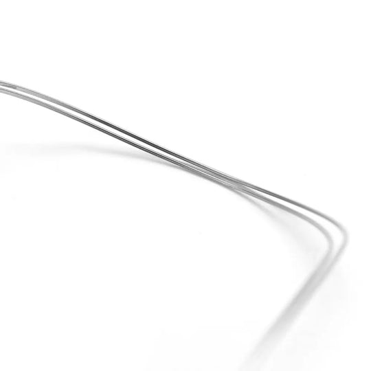 Archwire NiTi Reverse Curve True Form Rectangular 0.016 x 0.025 Upper 2pcs/Pack, close-up view of curved silver-colored orthodontic wire against white background, showing smooth surface and precise shape for dental treatment