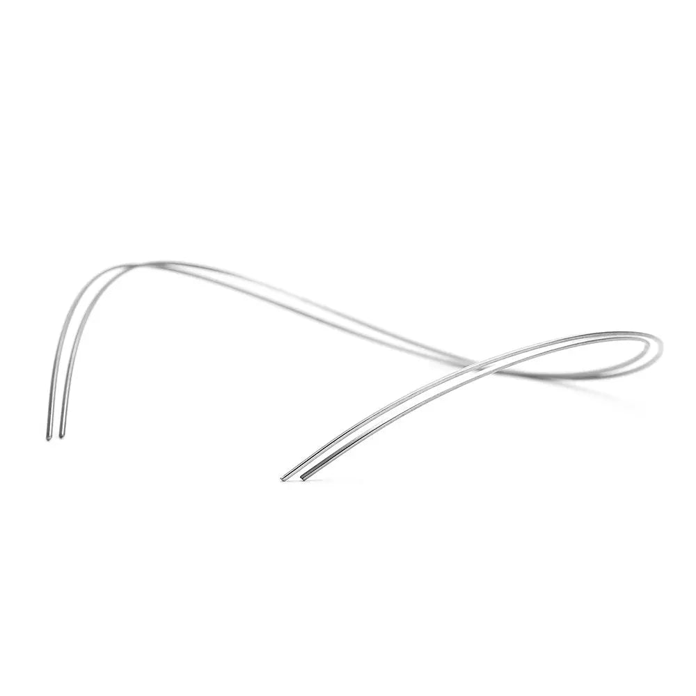 Archwire Niti Reverse Curve Rectangular 0.016 x 0.025 Upper 2pcs/Pack shown as thin, curved metallic wire for orthodontic use, demonstrating flexibility and shape for dental applications