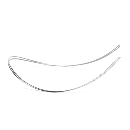 Archwire Niti Reverse Curve Rectangular 0.016 x 0.025 Lower 2pcs/Pack: Two silver-colored, curved orthodontic wires with a smooth, reflective surface, positioned side by side against a white background, showcasing their flexibility and precision shape for dental treatments.