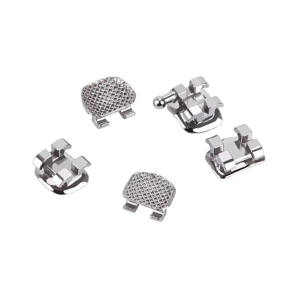 Dental Metal Brackets Mini Edgewise Slot .022 Hooks on 3 20pcs/Pack: Close-up of five silver metal orthodontic brackets with mesh base and hooks, showing various angles and designs for precise teeth alignment and wire attachment