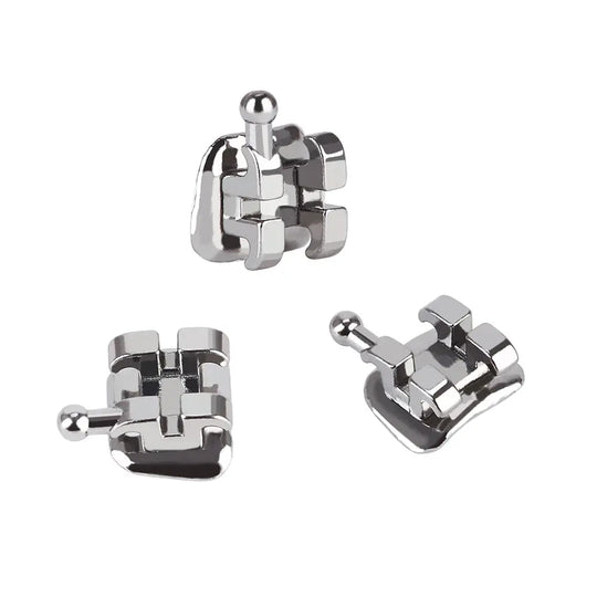 Dental Metal Brackets Mini Edgewise Slot .022 Hooks on 3 20pcs/Pack: Close-up of three shiny metal orthodontic brackets with hooks, showcasing intricate design and precision engineering for accurate teeth alignment and patient comfort