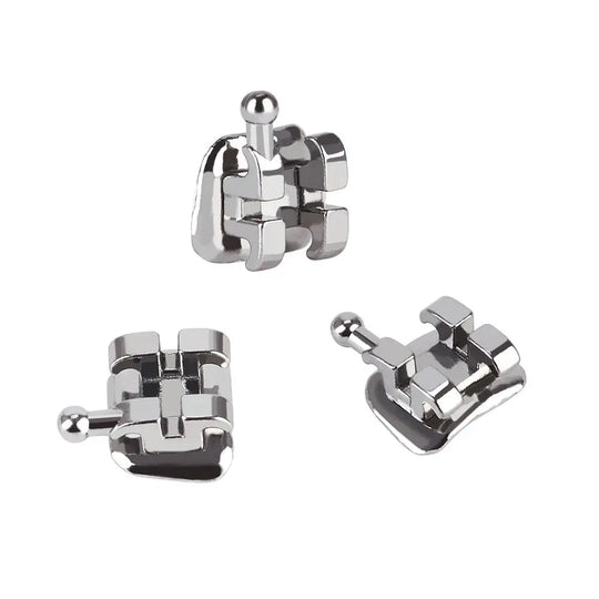 Dental Metal Brackets Standard Edgewise Slot .022 Hooks on 345 20pcs/Pack: Close-up of three shiny silver orthodontic brackets with hooks, showing intricate design and precise construction for accurate teeth alignment and easy wire placement.