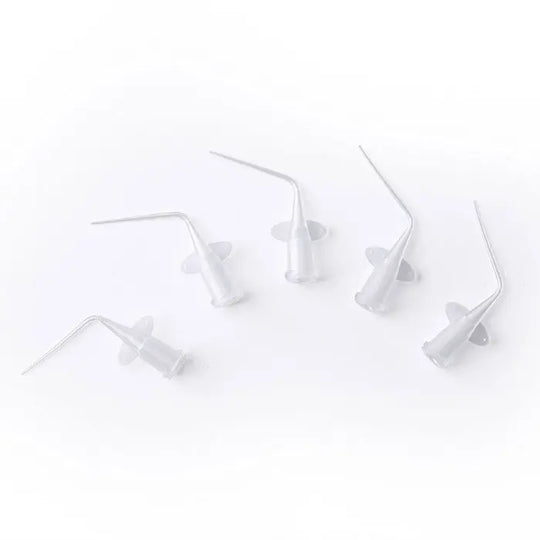 Dental Disposable Syringe Tip Endo Irrigation 2 Colors 50pcs/Pack: Close-up of five white plastic syringe tips with bent ends for dental procedures, displayed on a plain white background. Small, flexible design for precise root canal therapy and medicine administration.