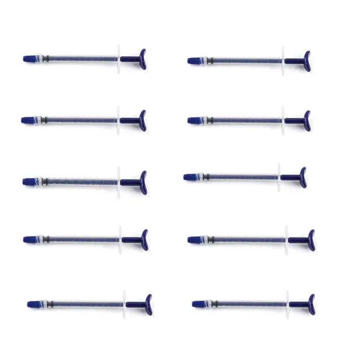 Dental Endo Irrigation Syringe Plastic Blue 1ML 1pc/Pack: Multiple blue plastic syringes arranged in rows, showcasing the slender design and blue plunger tips of these dental irrigation tools for endodontic procedures.