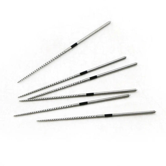 Six dental endodontic U files for root cleaning, part of 5 Packs Dental Endodontic U Files Niti For Root Cleaning #15-40 6pcs/Pack. Silver metal instruments with thin, elongated shafts and textured tips for precision dental work. Arranged in a fan-like pattern on a white background.