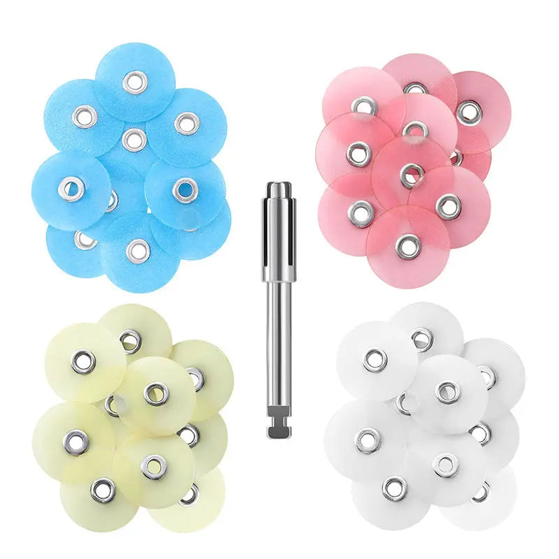 Dental Composite Finishing Polishing Discs 14mm 5/9" with Mandrel 40Pcs/Pack: Color-coded polishing discs in blue, pink, yellow, and white arranged in four groups, with a metal mandrel in the center. Each disc features a central hole for attachment.