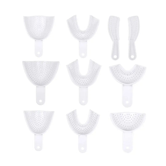 Dental Impression Trays Perforated Plastic Autoclave 5 Sizes Upper And Lower 2pcs/Pack displayed on white background. Various sizes and shapes of white plastic dental trays with perforations, including full mouth, front, and side options for upper and lower impressions.