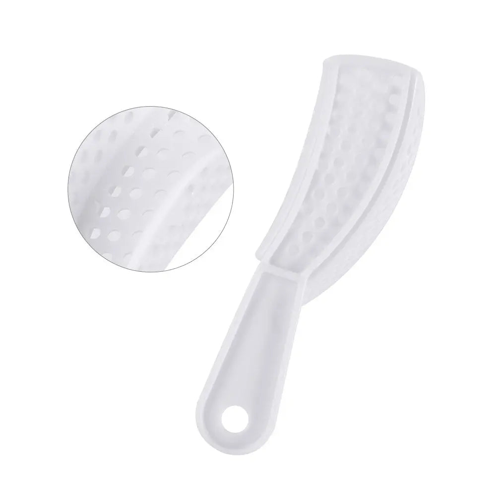 White perforated plastic dental impression tray with curved shape and handle, part of Dental Impression Trays Perforated Plastic Autoclave 5 Sizes Upper And Lower 2pcs/Pack set. Close-up view shows textured surface for secure impressions.