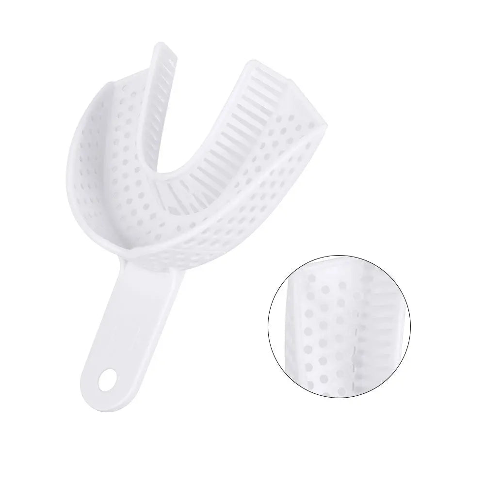 Dental Impression Trays Perforated Plastic Autoclave 5 Sizes Upper And Lower 2pcs/Pack: White plastic dental impression tray with perforated surface, curved shape for upper or lower jaw, and ergonomic handle. Close-up of perforated texture shown in circular inset.