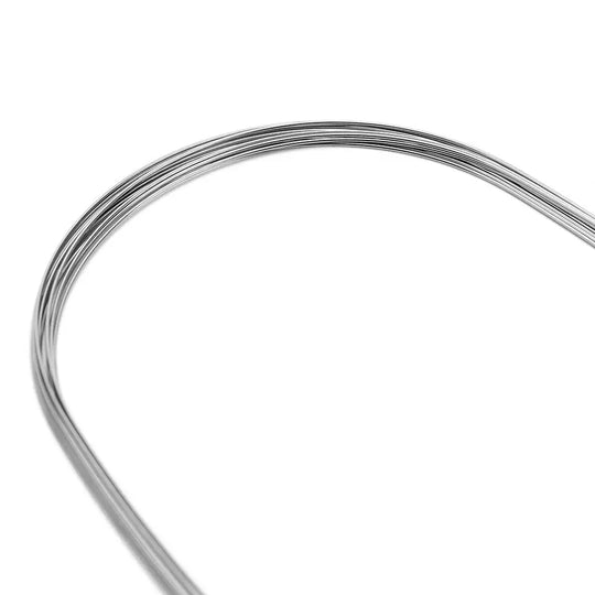 Archwire NiTi Super Elastic Square Round Full Size 10pcs/Pack - Dental orthodontic wire coiled in a circular shape, showing the smooth, shiny surface of the NiTi material. The wire's flexibility and uniform thickness are visible, highlighting its super elastic properties for effective tooth alignment.