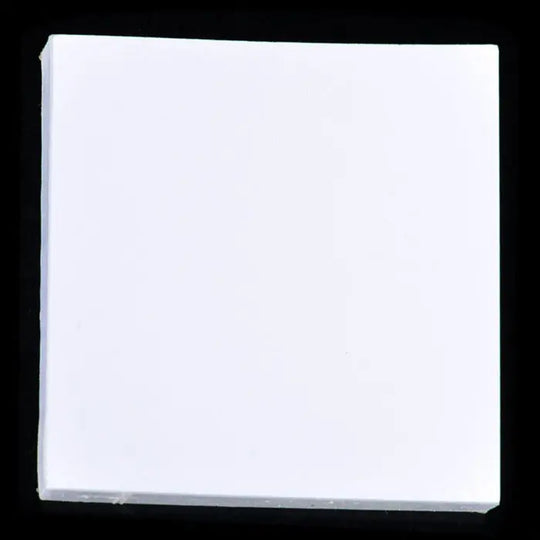 10 Pads Dental Mixing Pad 2x2 inch Bounded on 2 Sides 50Sheets/Pad: Close-up of a single white square mixing pad against a black background, showcasing its compact size and clean, professional appearance for dental applications