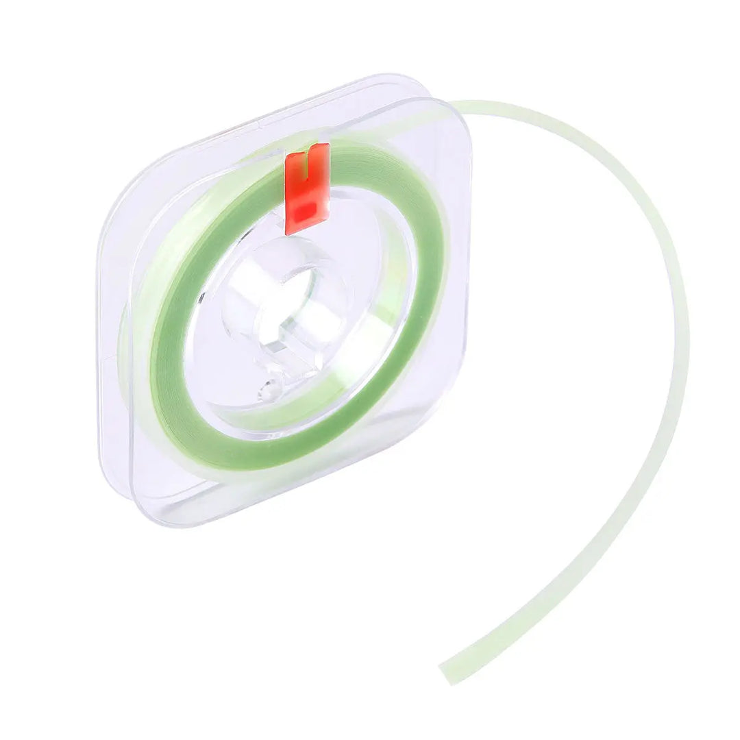 Dental Polishing Strip One Width And Three Colour-coded 6m/Roll in transparent dispenser. Green strip visible, indicating medium grit for pre-polishing. Red tab for easy dispensing. Compact square design for convenient storage and use in dental procedures.