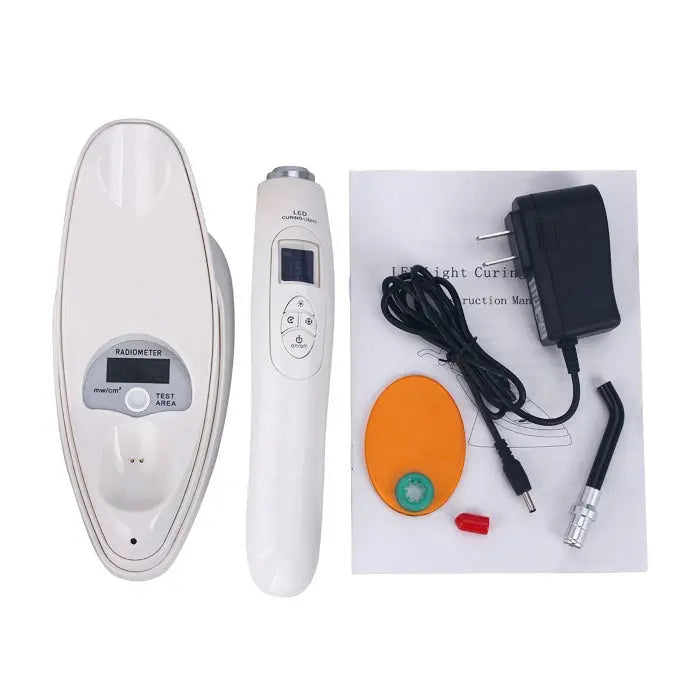 Dental LED Curing Light with built-in light meter, 380-515nm wavelength, 2000mW/cm² power. Set includes handheld device, charging base, optical fiber, shade board, battery, and accessories for dental procedures.