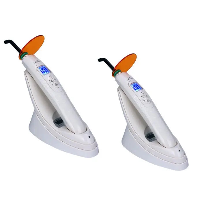 Dental LED Curing Light Built-in Light Meter Function 380-515nm 2000mW/cm² 5W Power: Two white handheld dental curing lights with orange shields, digital displays, and charging bases. Professional-grade dental equipment for efficient light-curing procedures.