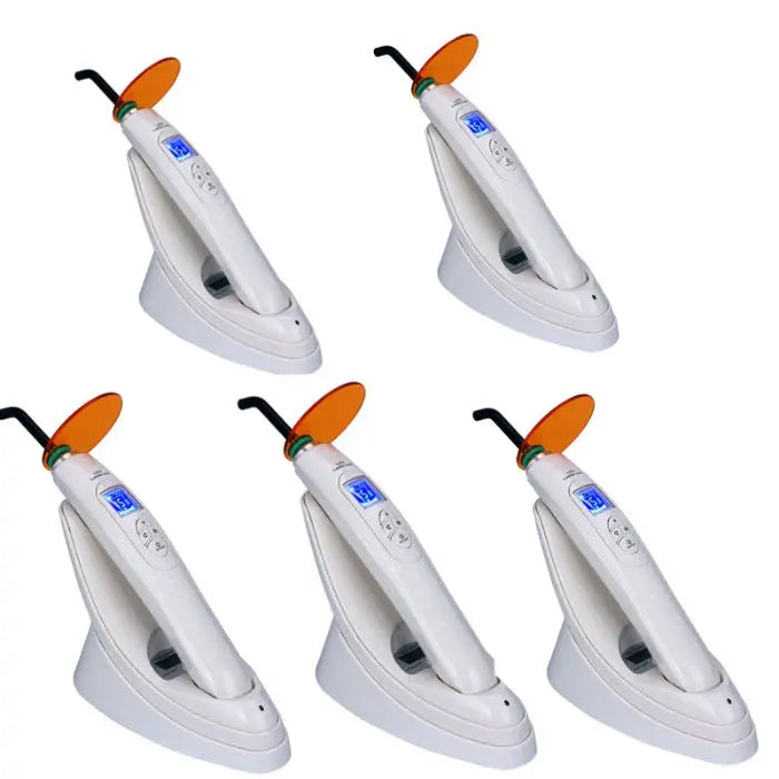 Dental LED Curing Light Built-in Light Meter Function 380-515nm 2000mW/cm² 5W Power: Five white handheld dental curing lights with orange tips and blue LCD displays on charging bases, showcasing professional dental equipment for efficient tooth restoration procedures.